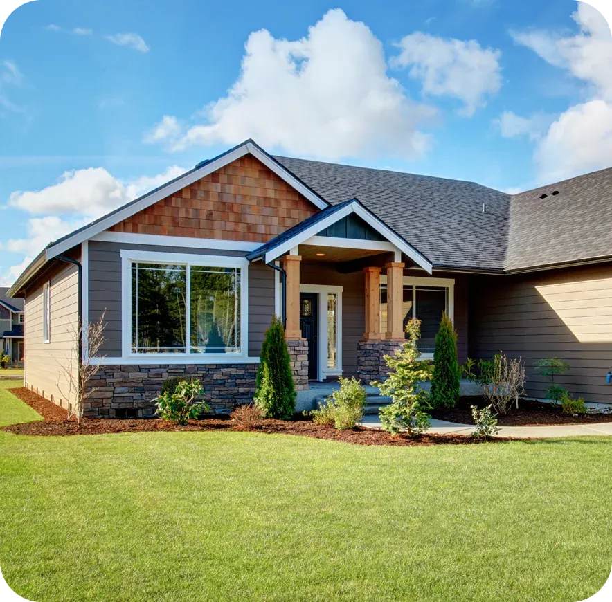 house with green lawn