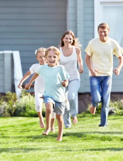 family running in back yard
